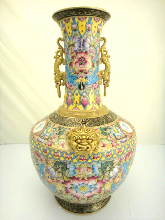 A rare antique Chinese Famille Rose enameled porcelain vase Lot 385 has a four-character Yongzheng mark and is possibly of the period. The interior is designed with dragon faces on the shoulder. It carries an estimate of about $10,000. Image courtesy of 888 Auctions.